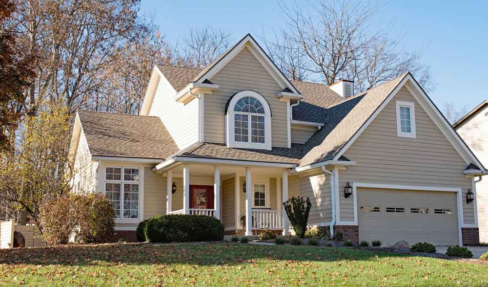 Top roof colors in Shreveport, such as charcoal gray, weathered wood, and brown, seen on local homes.