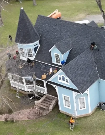 Large home roof replacement in progress