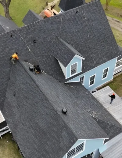 Residential shingle roof replacement in progress