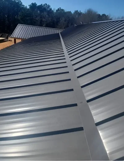 Metal standing seam roof installation close-up